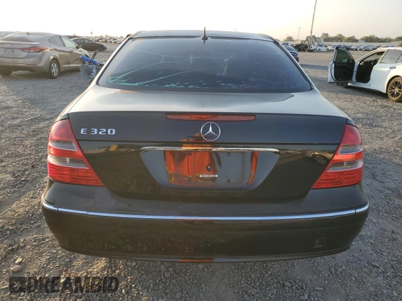 2003 Mercedes-Benz E-Class 3.2L with VIN WDBUF65J83A182953, listed as a Copart auction lot 69629174 with 336,517 mi miles and Salvage Title. Bid and sale history available at carsss.com. Image 6.