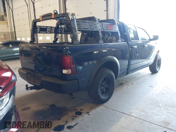 2021 Ram 1500 Warlock with VIN 1C6RR7GG9MS571707, listed as a IAAI auction lot 42218509 with 64,539 mi miles and . Bid and sale history available at DreamBid. Image 4.