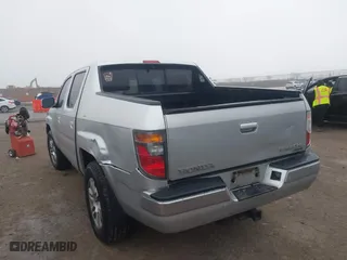 2006 Honda Ridgeline RTL with VIN 2HJYK16526H531190, listed as a IAAI auction lot 41450393 with 146,646 mi miles. Bid and sale history available at carsss.com. Image 3.