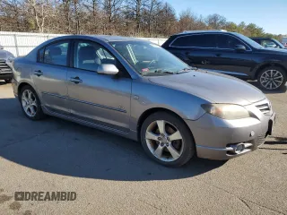 2005 Mazda 3 s with VIN JM1BK323351343009, listed as a Copart auction lot 45274015 with 124,019 mi miles and Clean Title. Bid and sale history available at carsss.com. Image 4.