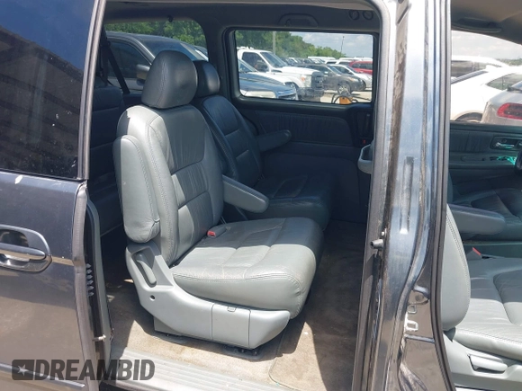 2004 Honda Odyssey EX-L with VIN 5FNRL18974B059223, listed as a IAAI auction lot 42249508 with 247,856 mi miles and . Bid and sale history available at DreamBid. Image 8.