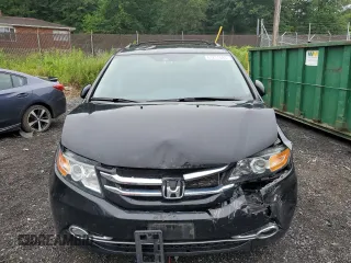 2016 Honda Odyssey Touring Elite with VIN 5FNRL5H90GB061827, listed as a Copart auction lot 61271695 with Not provided miles and Salvage title. Bid and sale history available at DreamBid. Image 5.