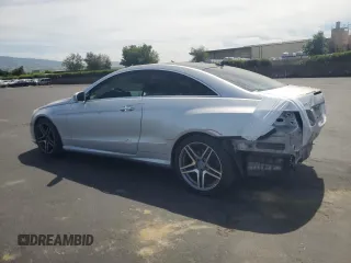 2010 Mercedes-Benz E 550 with VIN WDDKJ7CB5AF014783, listed as a Copart auction lot 54239565 with 157,025 mi miles and Salvage title. Bid and sale history available at DreamBid. Image 2.