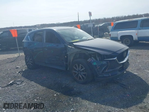 2018 Mazda CX-5 Grand Touring with VIN JM3KFBDM7J0343686, listed as a IAAI auction lot 41813638 with 74,084 mi miles. Bid and sale history available at carsss.com. Image 1.