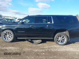 2019 Chevrolet Suburban Premier with VIN 1GNSKJKCXKR111502, listed as a IAAI auction lot 41075435 with 134,555 mi miles and . Bid and sale history available at DreamBid. Image 14.