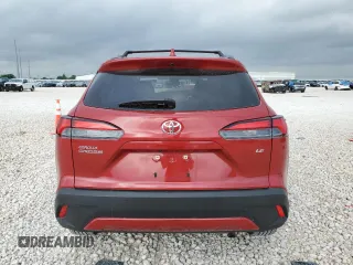 2022 Toyota Corolla Cross XLE with VIN 7MUDAAAG7NV019610, listed as a Copart auction lot 55146165 with 13,633 mi miles and Salvage title. Bid and sale history available at DreamBid. Image 6.