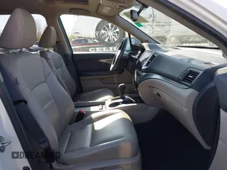 2016 Honda Pilot EX-L with VIN 5FNYF6H5XGB066295, listed as a IAAI auction lot 42063630 with 156,734 mi miles. Bid and sale history available at carsss.com. Image 5.