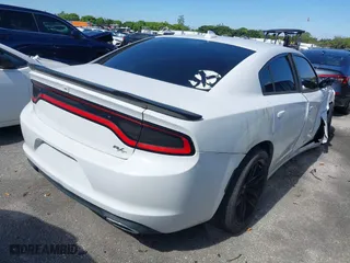 2016 Dodge Charger Road/Track with VIN 2C3CDXCT5GH241563, listed as a IAAI auction lot 41315509 with 83,030 mi miles. Bid and sale history available at carsss.com. Image 4.
