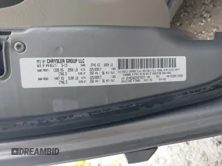 2013 Dodge Grand Caravan SE with VIN 2C4RDGBG2DR773577, listed as a IAAI auction lot 41823951 with 226,498 mi miles and . Bid and sale history available at DreamBid. Image 9.