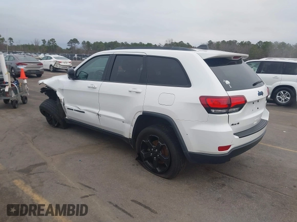 2018 Jeep Grand Cherokee Laredo E with VIN 1C4RJFAG2JC503130, listed as a IAAI auction lot 41527333 with 95,669 mi miles. Bid and sale history available at carsss.com. Image 3.