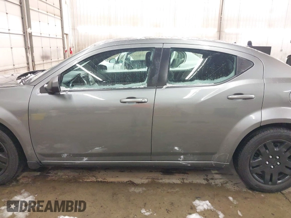 2013 Dodge Avenger SE with VIN 1C3CDZAB1DN581303, listed as a IAAI auction lot 41942469 with 123,330 mi miles. Bid and sale history available at carsss.com. Image 15.