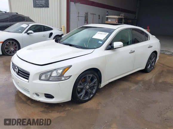 2014 Nissan Maxima SV with VIN 1N4AA5AP7EC441159, listed as a IAAI auction lot 41985393 with 114,915 mi miles and . Bid and sale history available at DreamBid. Image 2.