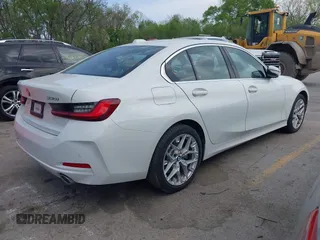 2025 BMW 3 Series 330i xDrive with VIN 3MW89CW00S8F11845, listed as a IAAI auction lot 42052983 with 4,879 mi miles. Bid and sale history available at carsss.com. Image 4.