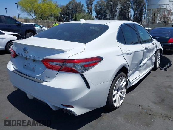 2019 Toyota Camry LE z VIN 4T1B11HK6KU754349, wystawiony jako IAAI lot #42262271 z przebiegiem 77 312 mil mil oraz . Historia ofert i sprzedaży dostępna na DreamBid. Obrazek 4.