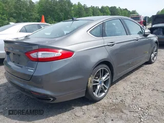 2013 Ford Fusion Titanium with VIN 3FA6P0K94DR241685, listed as a IAAI auction lot 42110859 with 179,231 mi miles. Bid and sale history available at carsss.com. Image 4.