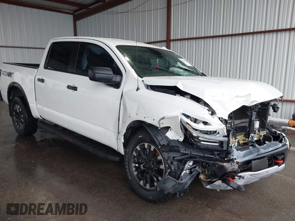 2021 Nissan Titan Pro-4X z VIN 1N6AA1ED7MN511004, wystawiony jako IAAI lot #42184599 z przebiegiem 36 086 mil mil oraz . Historia ofert i sprzedaży dostępna na DreamBid. Obrazek 1.