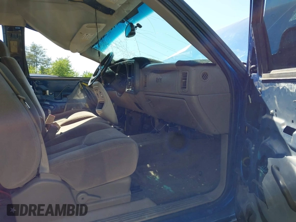 2003 GMC Sierra 1500 SLE z VIN 2GTEC19T131361262, wystawiony jako IAAI lot #41994769 z przebiegiem Nie podano mil oraz . Historia ofert i sprzedaży dostępna na DreamBid. Obrazek 5.