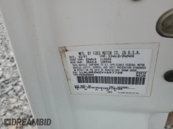 1997 Lincoln Town Car Signature z VIN 1LNLM82W2VY697709, wystawiony jako Copart lot #70506934 z przebiegiem 200 288 mil mil oraz Szkoda całkowita • Salvage title. Historia ofert i sprzedaży dostępna na DreamBid. Obrazek 12.