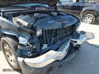 2004 GMC Sierra 1500 SLE with VIN 2GTEC19T141304318, listed as a IAAI auction lot 40534839 with 76,424 mi miles. Bid and sale history available at carsss.com. Image 6.