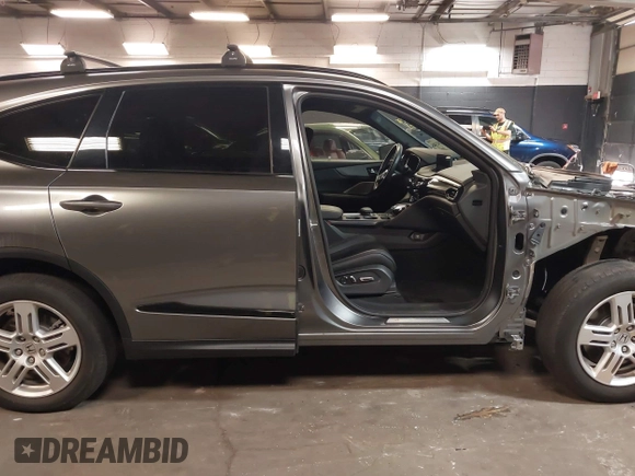 2022 Acura MDX w/A-Spec Package with VIN 5J8YE1H09NL050997, listed as a IAAI auction lot 42202385 with 15,076 mi miles and . Bid and sale history available at DreamBid. Image 13.