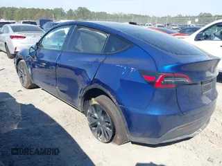 2025 Tesla Model Y Long Range with VIN 7SAYGDEEXSA346006, listed as a IAAI auction lot 41835610 with 1,896 mi miles and . Bid and sale history available at carsss.com. Image 3.