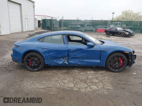2022 Porsche Taycan GTS z VIN WP0AD2Y17NSA59692, wystawiony jako IAAI lot #41961572 z przebiegiem 12 680 mil mil oraz . Historia ofert i sprzedaży dostępna na DreamBid. Obrazek 14.