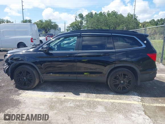 2022 Honda Pilot Special Edition with VIN 5FNYF5H21NB011652, listed as a IAAI auction lot 42772962 with 69,046 mi miles and . Bid and sale history available at DreamBid. Image 14.
