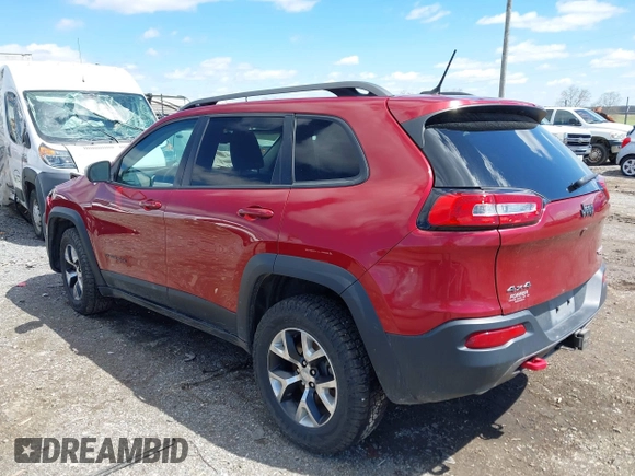 2015 Jeep Cherokee Trailhawk with VIN 1C4PJMBS0FW728361, listed as a IAAI auction lot 41978853 with 123,127 mi miles. Bid and sale history available at carsss.com. Image 3.