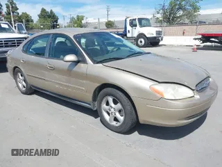2001 Ford Taurus SES with VIN 1FAFP55U61A104864, listed as a IAAI auction lot 42004016 with 166,694 mi miles. Bid and sale history available at carsss.com. Image 1.