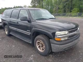 2000 Chevrolet Suburban LT with VIN 3GNFK16T0YG127485, listed as a IAAI auction lot 41957332 with 240,920 mi miles. Bid and sale history available at carsss.com. Image 1.