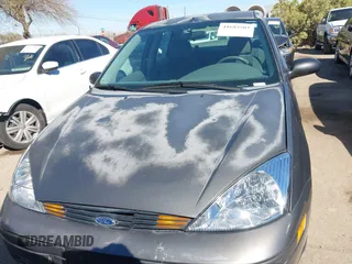 2003 Ford Focus SE with VIN 1FAFP34353W228000, listed as a IAAI auction lot 41682503 with 107,968 mi miles and . Bid and sale history available at carsss.com. Image 12.