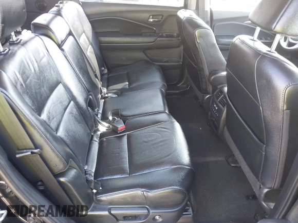 2018 Honda Pilot EX-L with VIN 5FNYF6H59JB062326, listed as a IAAI auction lot 40662881 with 77,573 mi miles and . Bid and sale history available at DreamBid. Image 8.