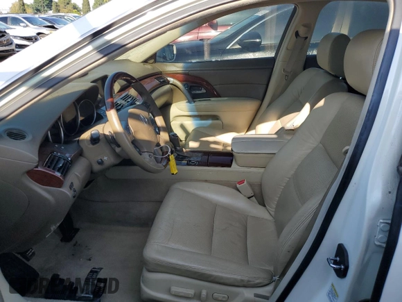 2009 Acura RL Tech Pkg with VIN JH4KB26659C001231, listed as a Copart auction lot 54249085 with 130,144 mi miles and Clean Title. Bid and sale history available at carsss.com. Image 7.