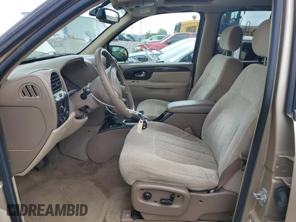 2004 GMC Envoy SLT with VIN 1GKDT13S142425057, listed as a Copart auction lot 69037524 with 231,483 mi miles and Salvage Title. Bid and sale history available at carsss.com. Image 7.