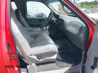 1999 Ford F-150 z VIN 1FTZX1723XNA41946, wystawiony jako IAAI lot #42255760 z przebiegiem 162 612 mil mil oraz . Historia ofert i sprzedaży dostępna na DreamBid. Obrazek 5.