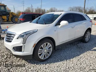 2018 Cadillac XT5 Premium Luxury FWD z VIN 1GYKNERS3JZ139719, wystawiony jako Copart lot #52436595 z przebiegiem Nie podano mil oraz Szkody całkowita. Historia ofert i sprzedaży dostępna na DreamBid. Obrazek 1.