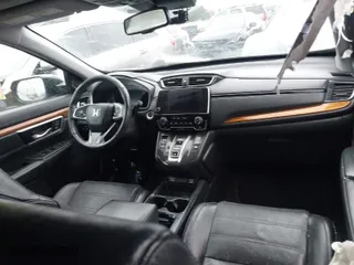 2020 Honda CR-V Hybrid EX-L with VIN 7FART6H8XLE011609, listed as a IAAI auction lot 41573897 with 95,966 mi miles. Bid and sale history available at carsss.com. Image 5.