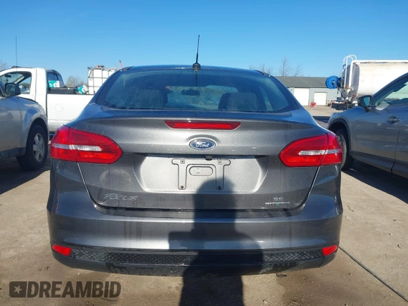 2016 Ford Focus SE with VIN 1FADP3F26GL233564, listed as a IAAI auction lot 42083597 with 153,404 mi miles and . Bid and sale history available at DreamBid. Image 17.