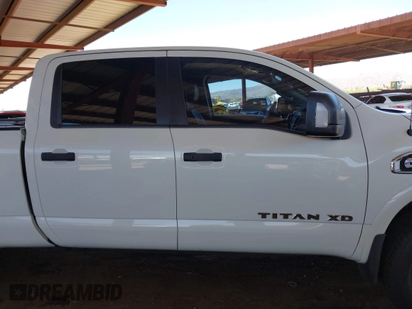 2019 Nissan Titan Pro-4X with VIN 1N6BA1F45KN533051, listed as a IAAI auction lot 42587343 with 134,768 mi miles and . Bid and sale history available at DreamBid. Image 13.
