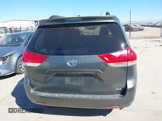 2013 Toyota Sienna XLE AAS with VIN 5TDYK3DCXDS379272, listed as a IAAI auction lot 41407282 with 240,491 mi miles and . Bid and sale history available at carsss.com. Image 16.