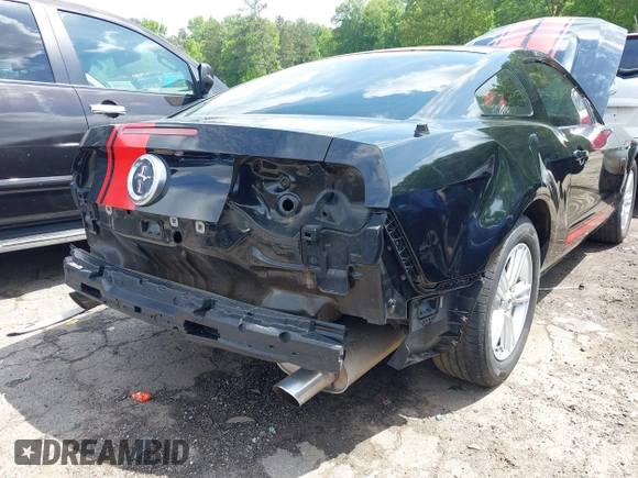 2011 Ford Mustang V6 with VIN 1ZVBP8AM5B5143338, listed as a IAAI auction lot 42161117 with 143,635 mi miles and . Bid and sale history available at DreamBid. Image 6.