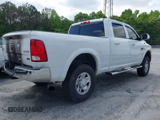 2012 Ram 2500 Laramie Longhorn with VIN 3C6UD5GL1CG121386, listed as a IAAI auction lot 42119700 with 207,173 mi miles and . Bid and sale history available at DreamBid. Image 4.