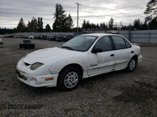 2002 Pontiac Sunfire SE z VIN 1G2JB524327294701, wystawiony jako Copart lot #73310254 z przebiegiem Nie podano mil oraz Czysty tytuł • Clean title. Historia ofert i sprzedaży dostępna na DreamBid. Obrazek 1.