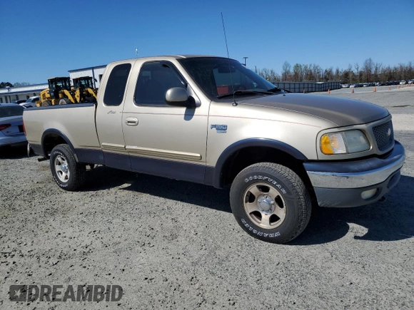 1999 Ford F-150 XL with VIN 1FTRX18LXXNA59898, listed as a Copart auction lot 49326055 with 0 mi miles and Salvage Title. Bid and sale history available at carsss.com. Image 4.