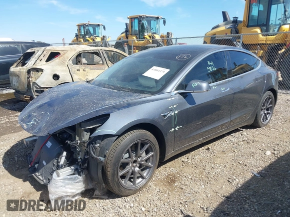 2019 Tesla Model 3 Mid Range with VIN 5YJ3E1EA5KF327679, listed as a IAAI auction lot 41804379 with 87,208 mi miles and . Bid and sale history available at DreamBid. Image 21.