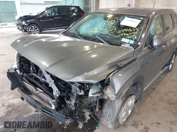 2019 Hyundai Santa Fe SE with VIN 5NMS2CAD7KH094144, listed as a IAAI auction lot 41984633 with 46,307 mi miles and . Bid and sale history available at DreamBid. Image 12.