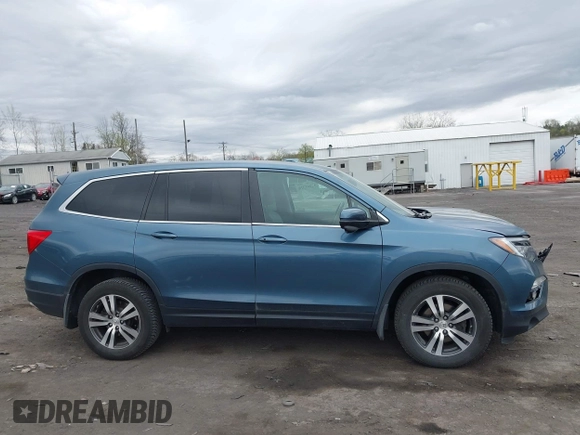 2017 Honda Pilot EX-L with VIN 5FNYF6H50HB101394, listed as a IAAI auction lot 42083318 with 159,359 mi miles and . Bid and sale history available at DreamBid. Image 13.