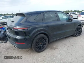 2021 Porsche Cayenne E-Hybrid Hybrid z VIN WP1AE2AYXMDA24566, wystawiony jako IAAI lot #41815737 z przebiegiem 51 149 mil mil oraz . Historia ofert i sprzedaży dostępna na DreamBid. Obrazek 4.