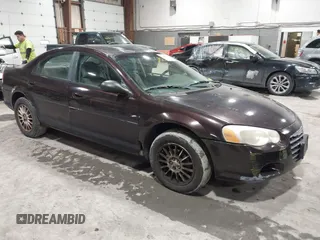 2004 Chrysler Sebring LX with VIN 1C3EL46X14N104129, listed as a IAAI auction lot 41642315 with 137,609 mi miles and . Bid and sale history available at DreamBid. Image 1.