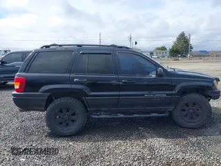 2001 Jeep Grand Cherokee Laredo with VIN 1J4GW48N61C642351, listed as a IAAI auction lot 41783127 with 194,578 mi miles and . Bid and sale history available at DreamBid. Image 13.